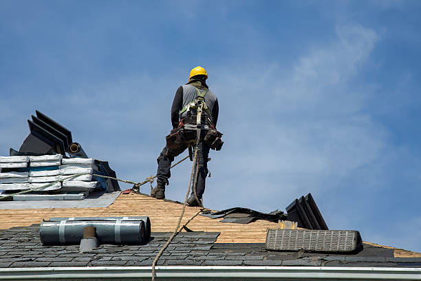 Professional Roofing technician working in New York Mills, NY